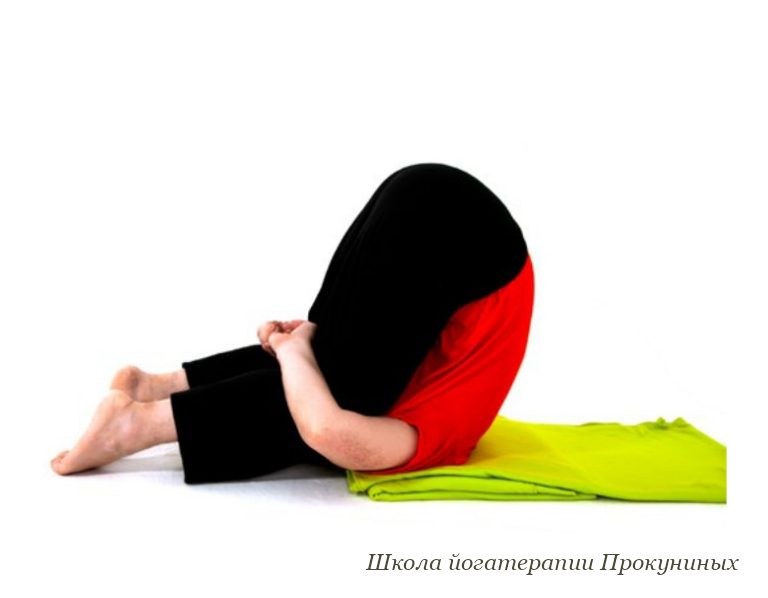Карнапидасана